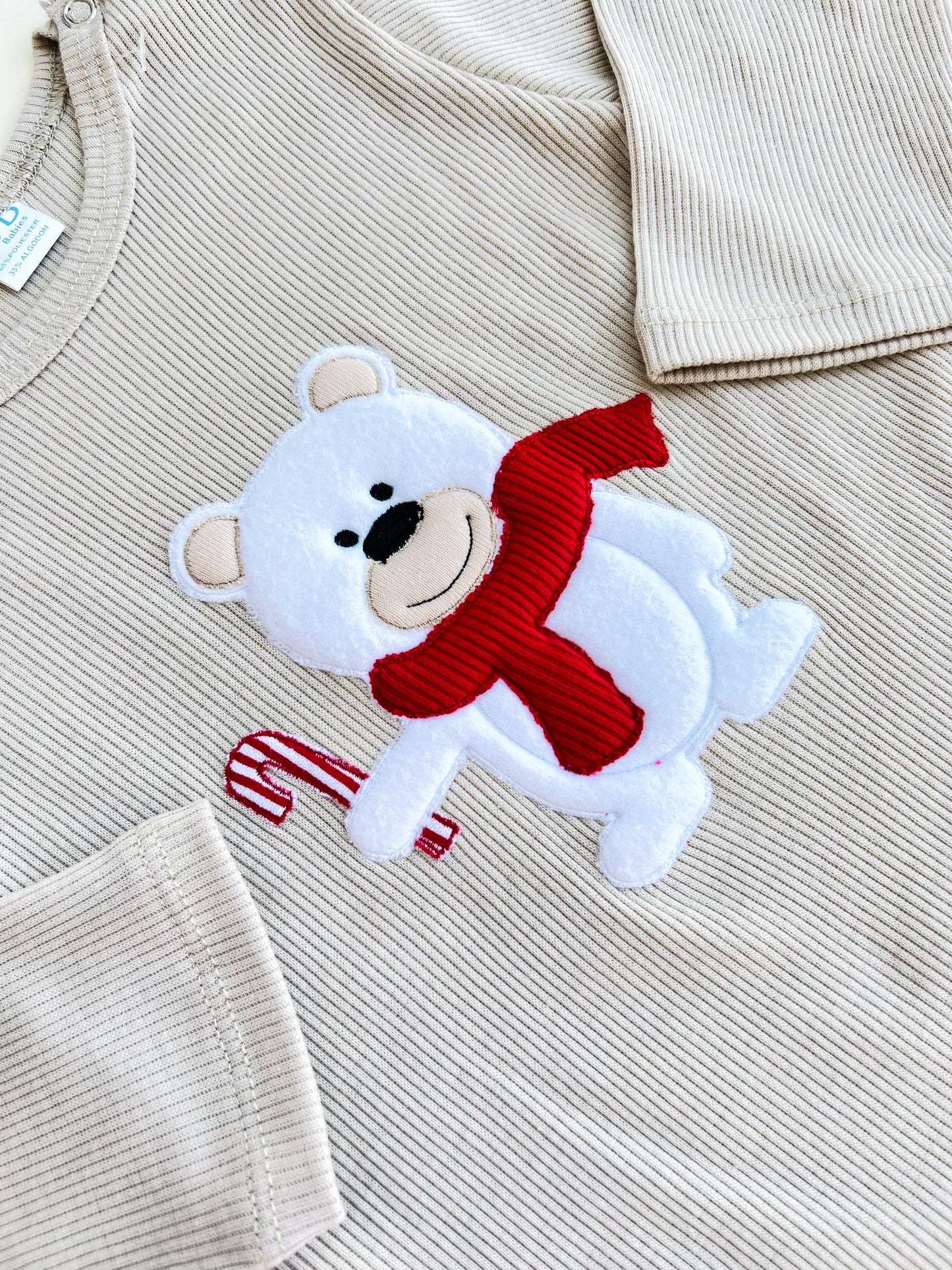 ENTERIZO NAVIDEÑO DE OSITO CON GORRO