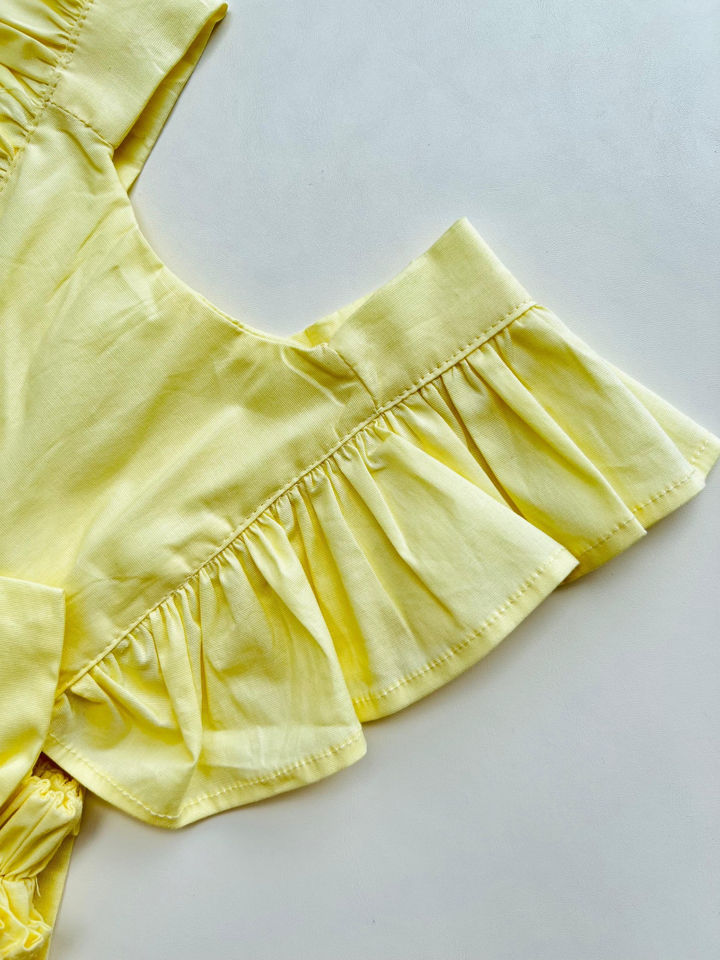 PELELE BABY AMARILLO CON LAZO