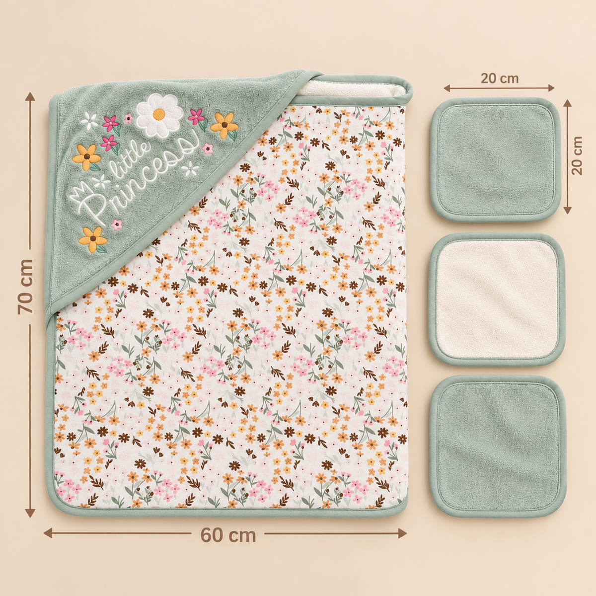 Toalla floral verde menta y blanca de 70 por 60 centímetros junto a paños de 20 por 20 centímetros