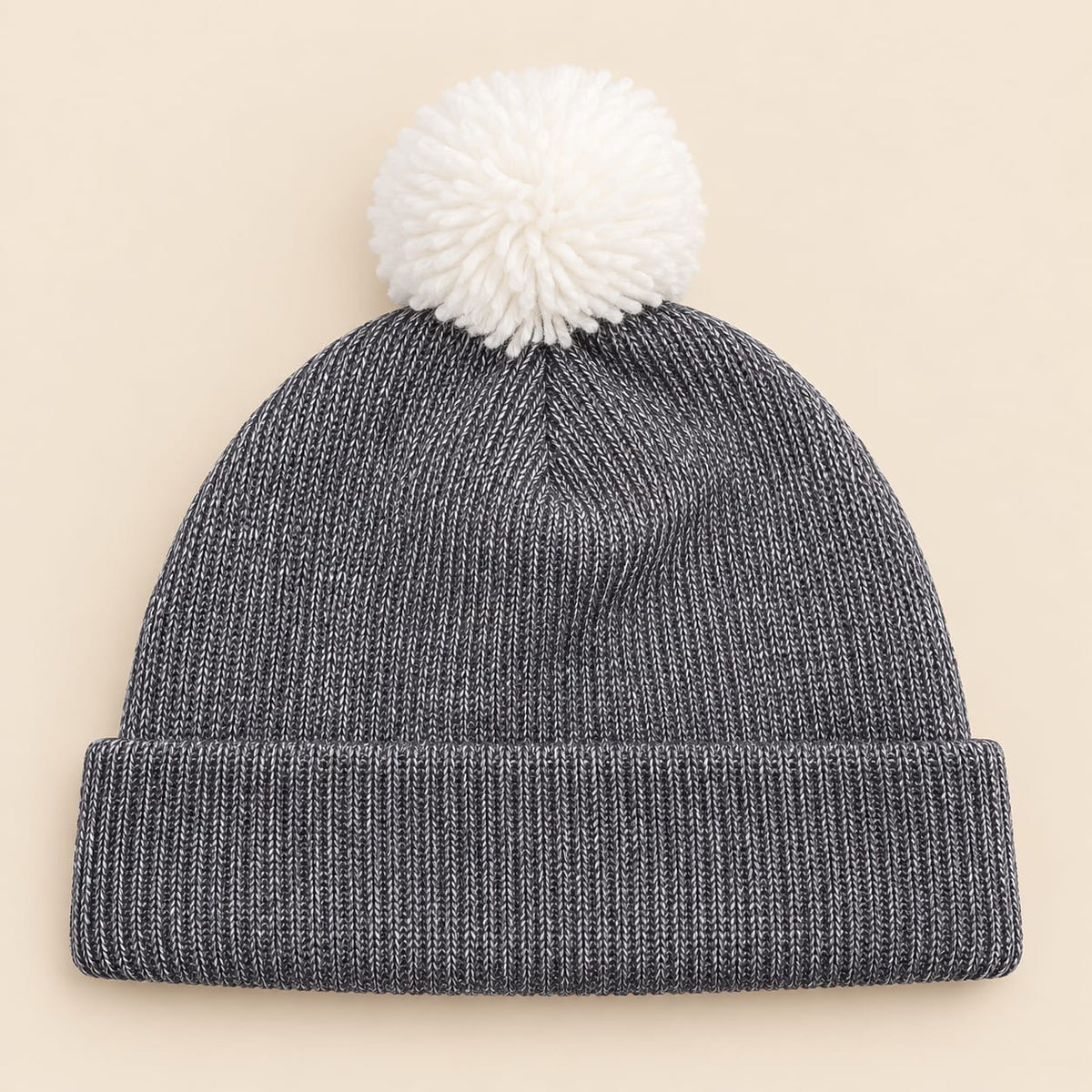 Gorro tejido para bebé gris jaspeado con pompón blanco