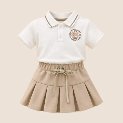 ⚪️ Conjunto 2 Piezas Niña | Polo Blanco Athletic + Falda Plisada Beige | Mara Baby