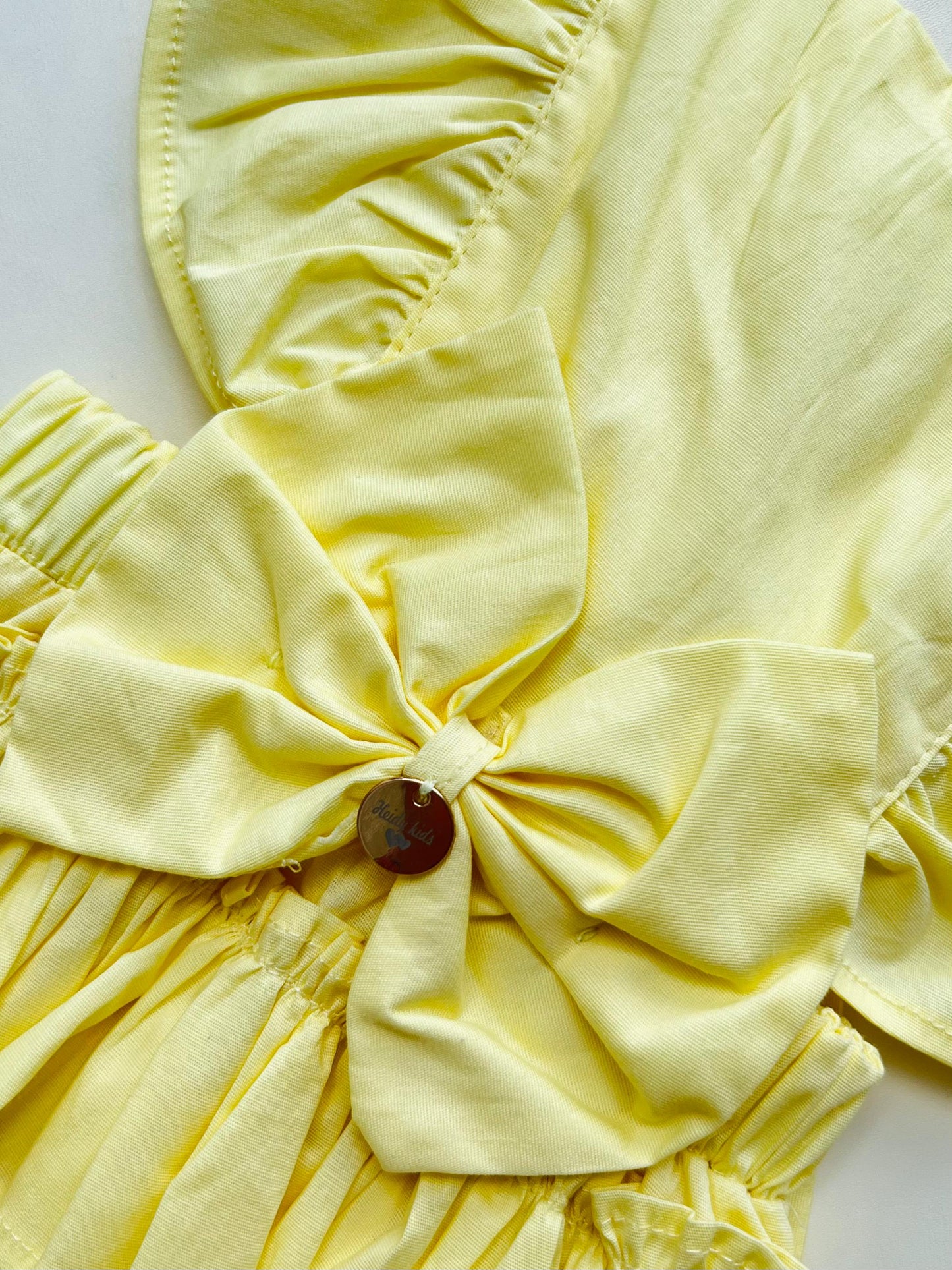 PELELE BABY AMARILLO CON LAZO