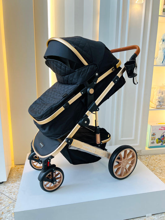 COCHE MOISES MAXIBABY GOLD NEGRO