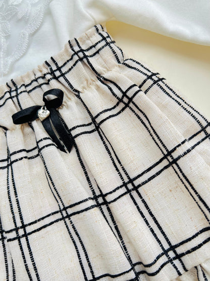 CONJUNTO FALDA A CUADROS CON MEDIAS