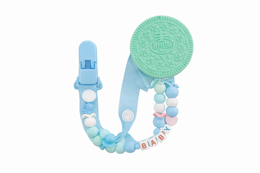 MORDEDERO EN SILICONA TIPO GALLETA + PORTA CHUPO CON CLIP DISEÑO - MODERNO EN TONOS CELESTES