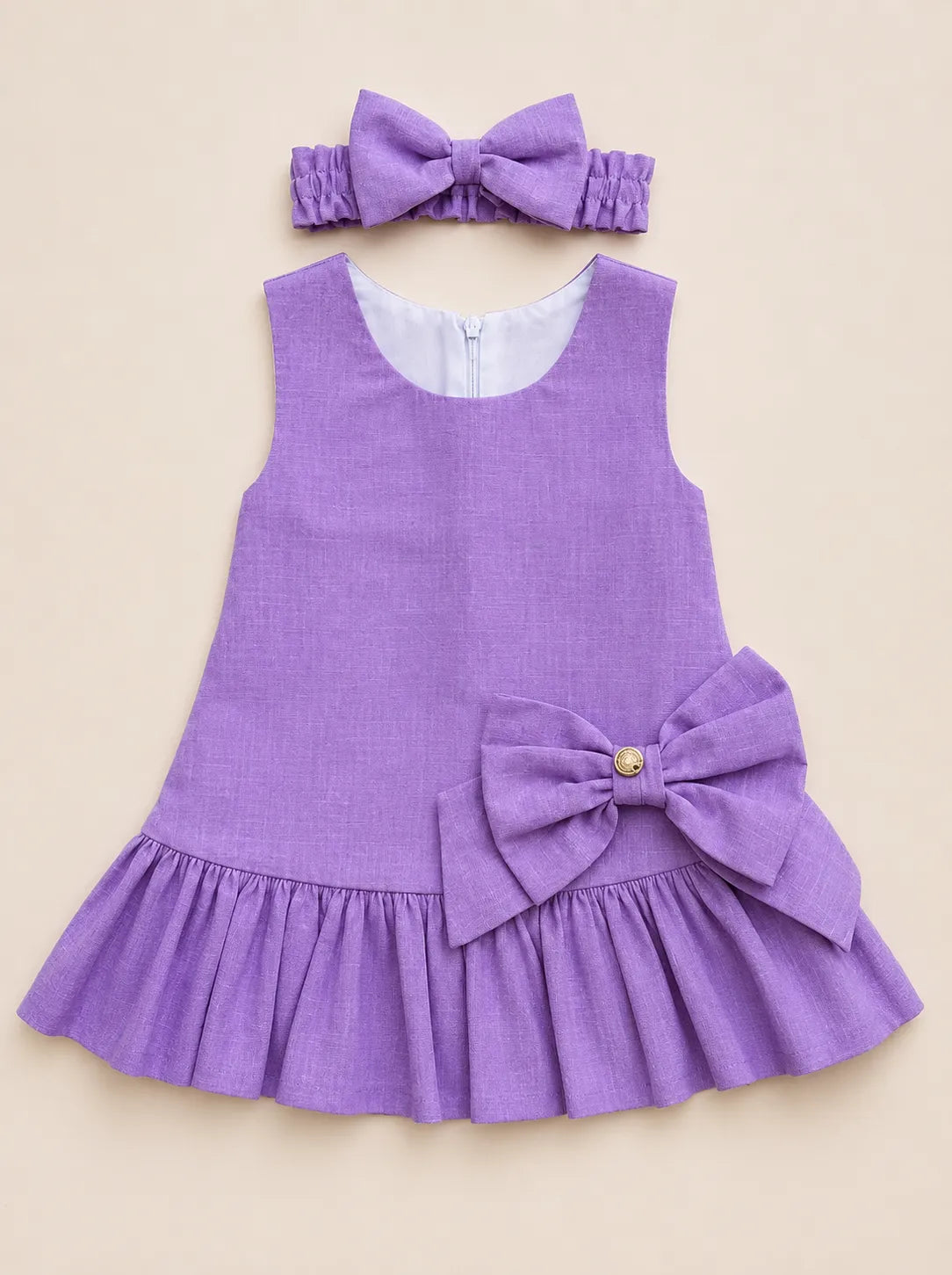 VESTIDO PLISADO CON MOÑO