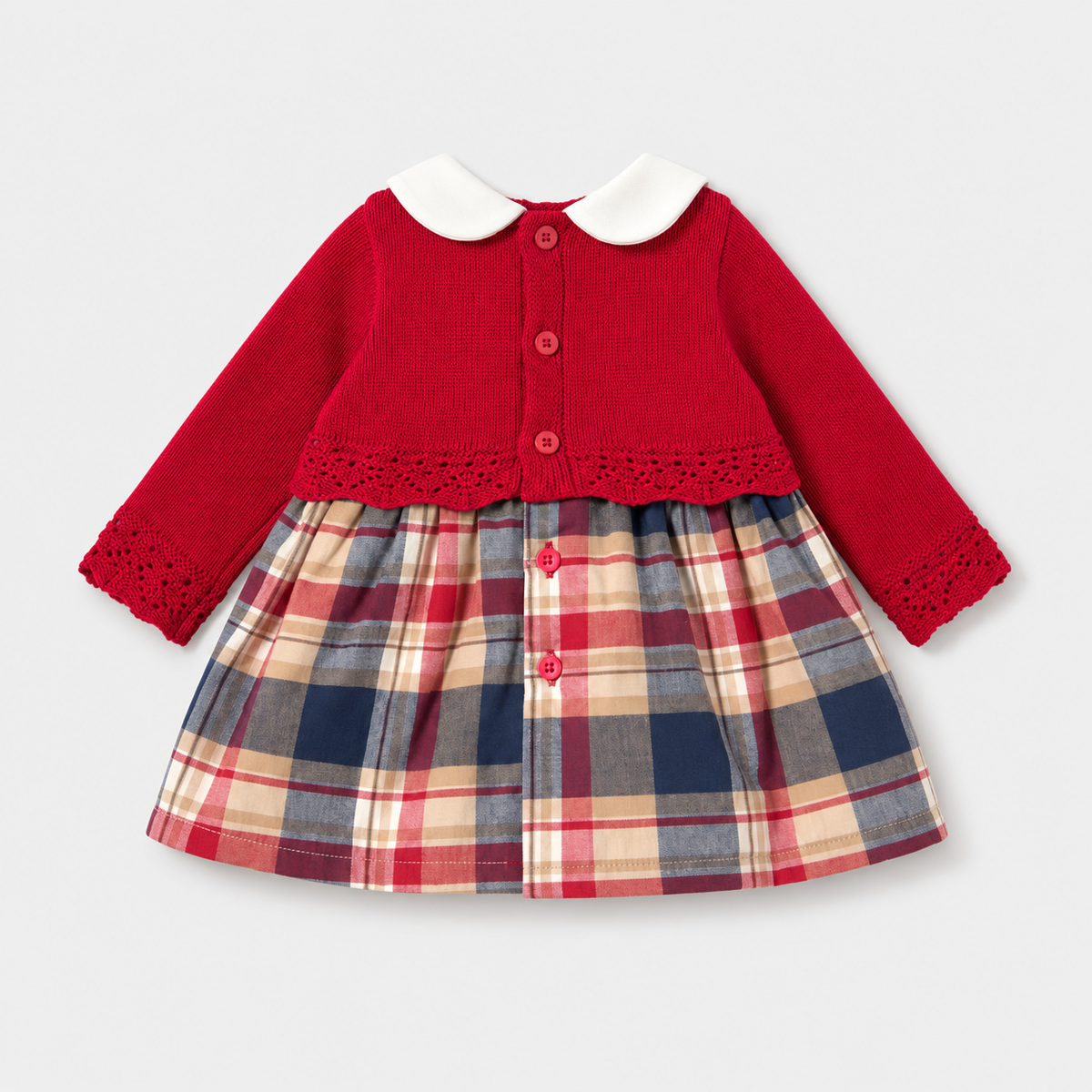Vista posterior de vestido tricot rojo con falda de cuadros para recién nacida