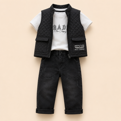⭕️ Conjunto 3 Piezas Bebé – Chaleco Acolchado Negro, Camiseta BAD MCC y Jean Negro Ripped