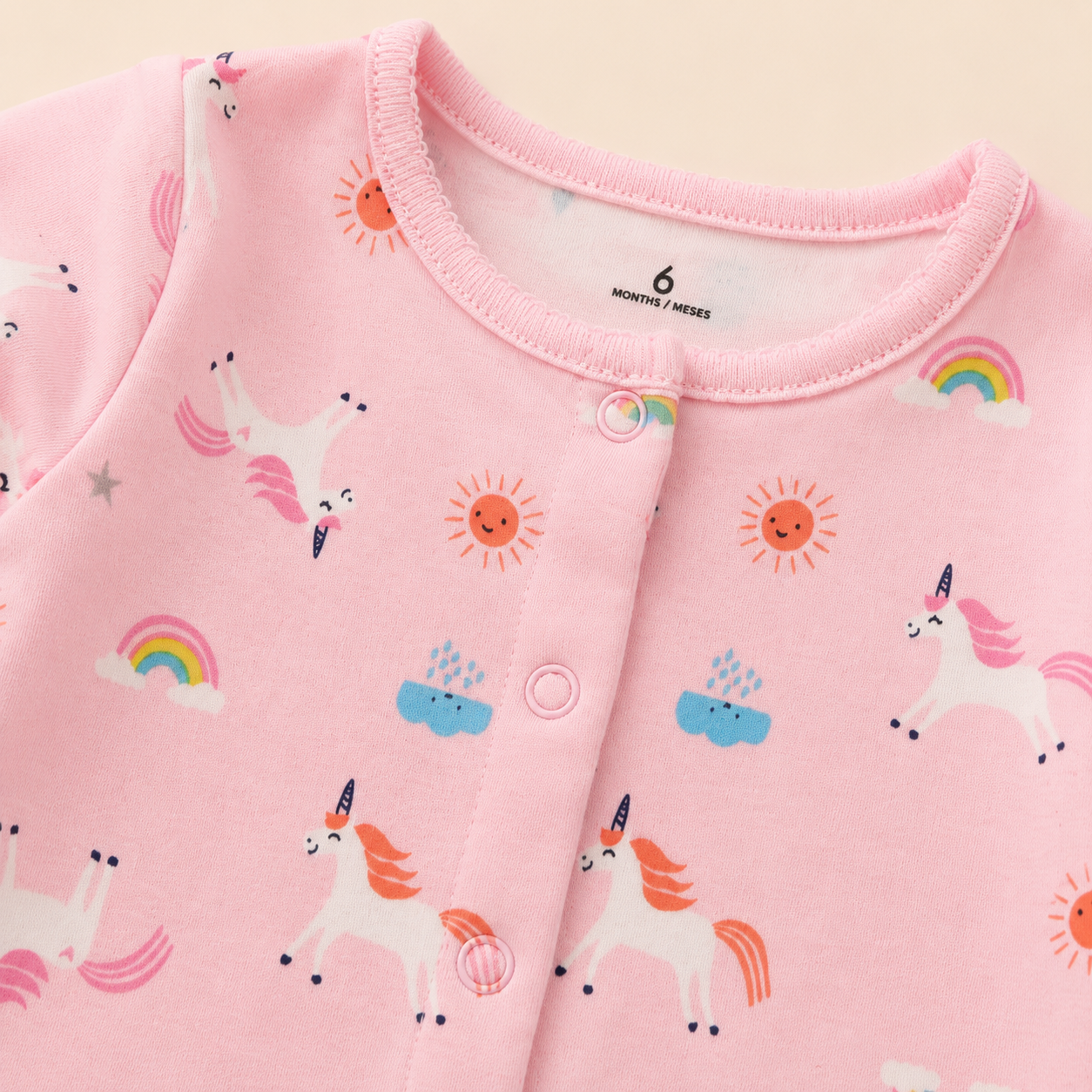 Enterizo Bebé Niña Rosa Estampado Unicornios Arcoíris con Piecitos Integrados