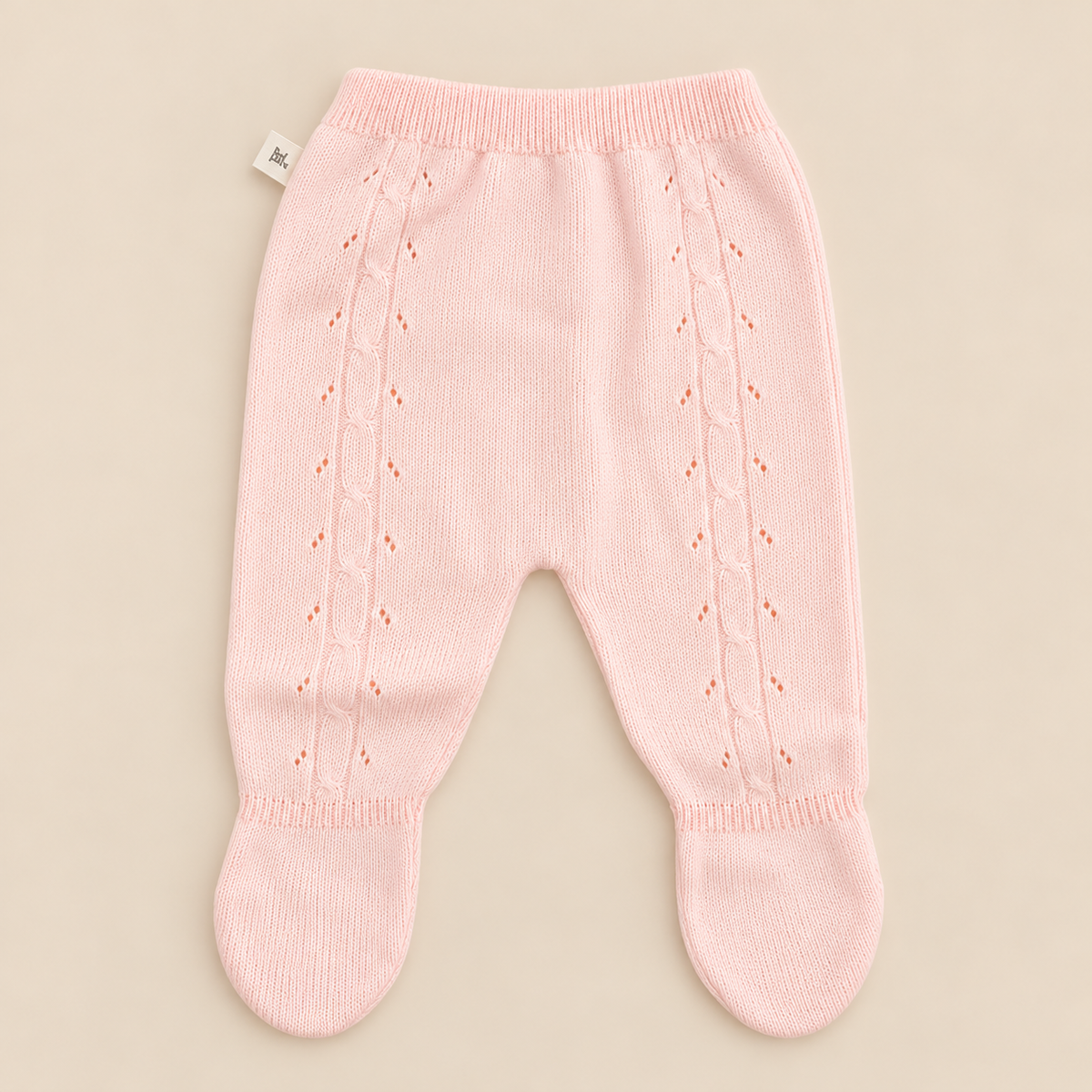 Conjunto para bebé tejido rosa y blanco de 4 piezas