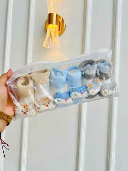 MEDIAS ANTIDESLIZANTES PARA BEBE CON LAZO DECORATIVO - DISEÑO ANIMALITOS