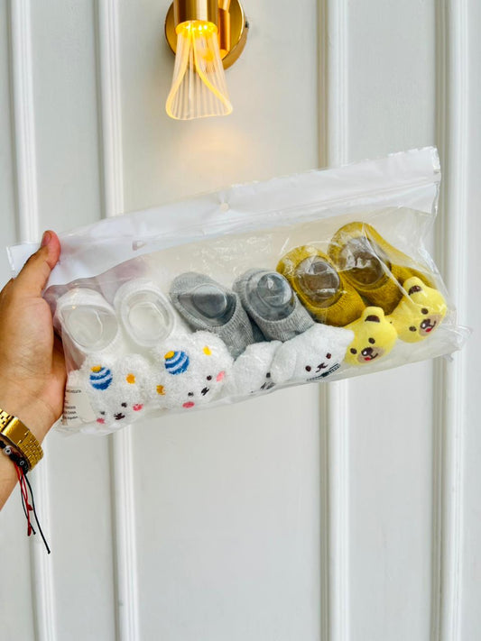 MEDIAS ANTIDESLIZANTES PARA BEBE CON LAZO DECORATIVO - DISEÑO ANIMALITOS