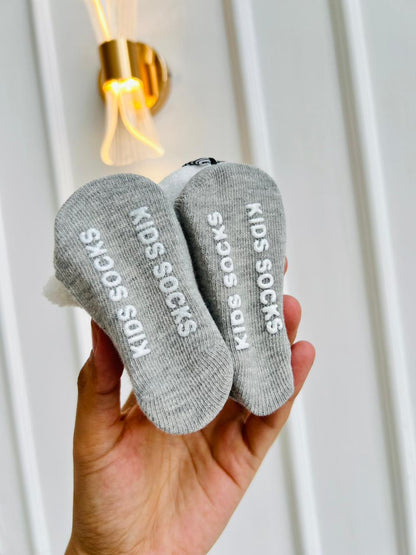 MEDIAS ANTIDESLIZANTES PARA BEBE CON LAZO DECORATIVO - DISEÑO ANIMALITOS