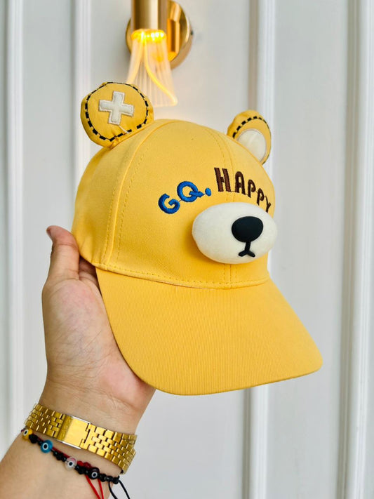 GORRA INFANTIL CON OREJITAS Y OSO DECORATIVO - COLOR AMARILLO