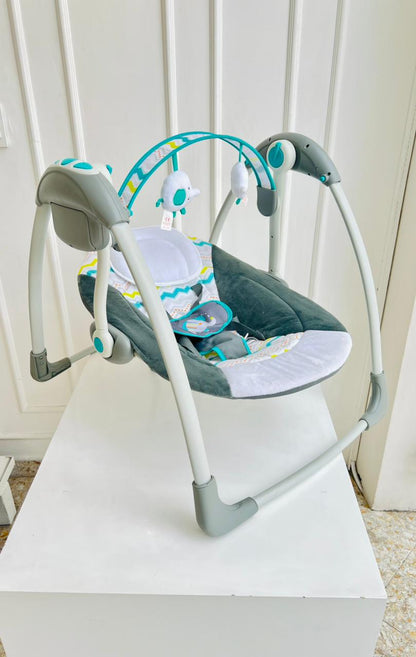 SILLA MECEDORA ELECTRICA PARA BEBÉ CON JUGUETES COLGANTES