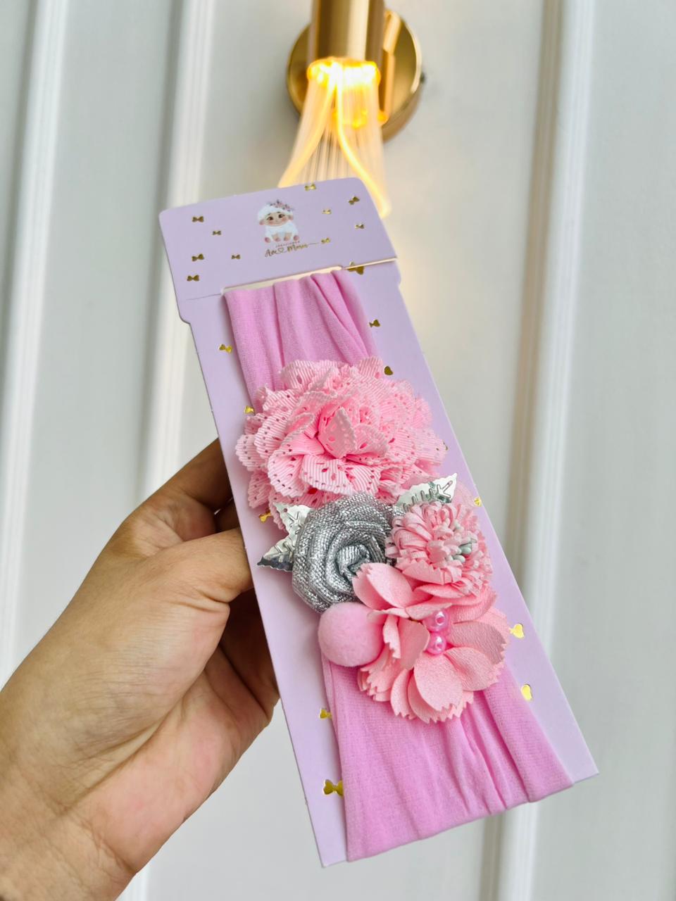 DIADEMA TURBANTE PARA BEBÉ CON FLORES DECORATIVAS - COLOR ROSADO