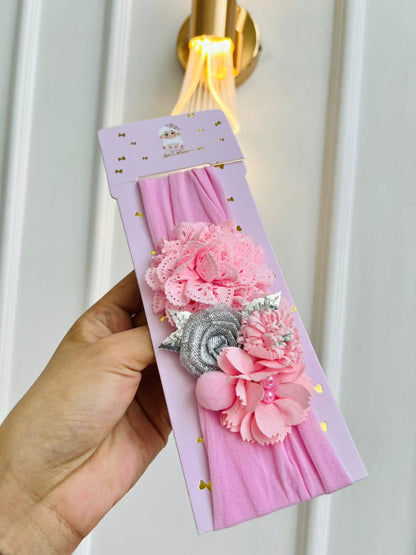 DIADEMA TURBANTE PARA BEBÉ CON FLORES DECORATIVAS - COLOR ROSADO