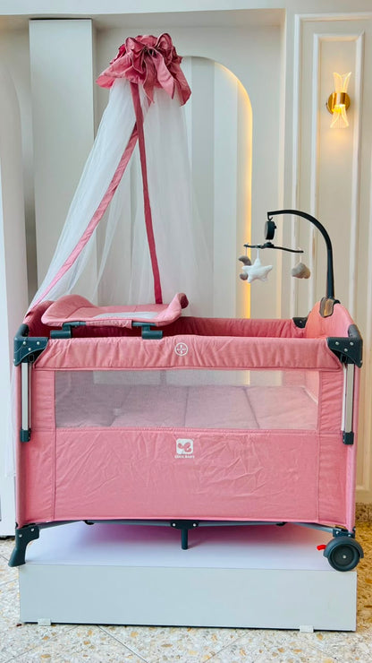 Cuna de Viaje Multifuncional Cool Baby Rosado – Toldo, Móvil y Cambiador Incluidos