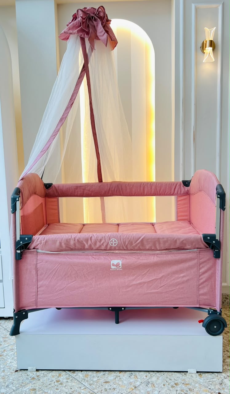 Cuna de Viaje Multifuncional Cool Baby Rosado – Toldo, Móvil y Cambiador Incluidos