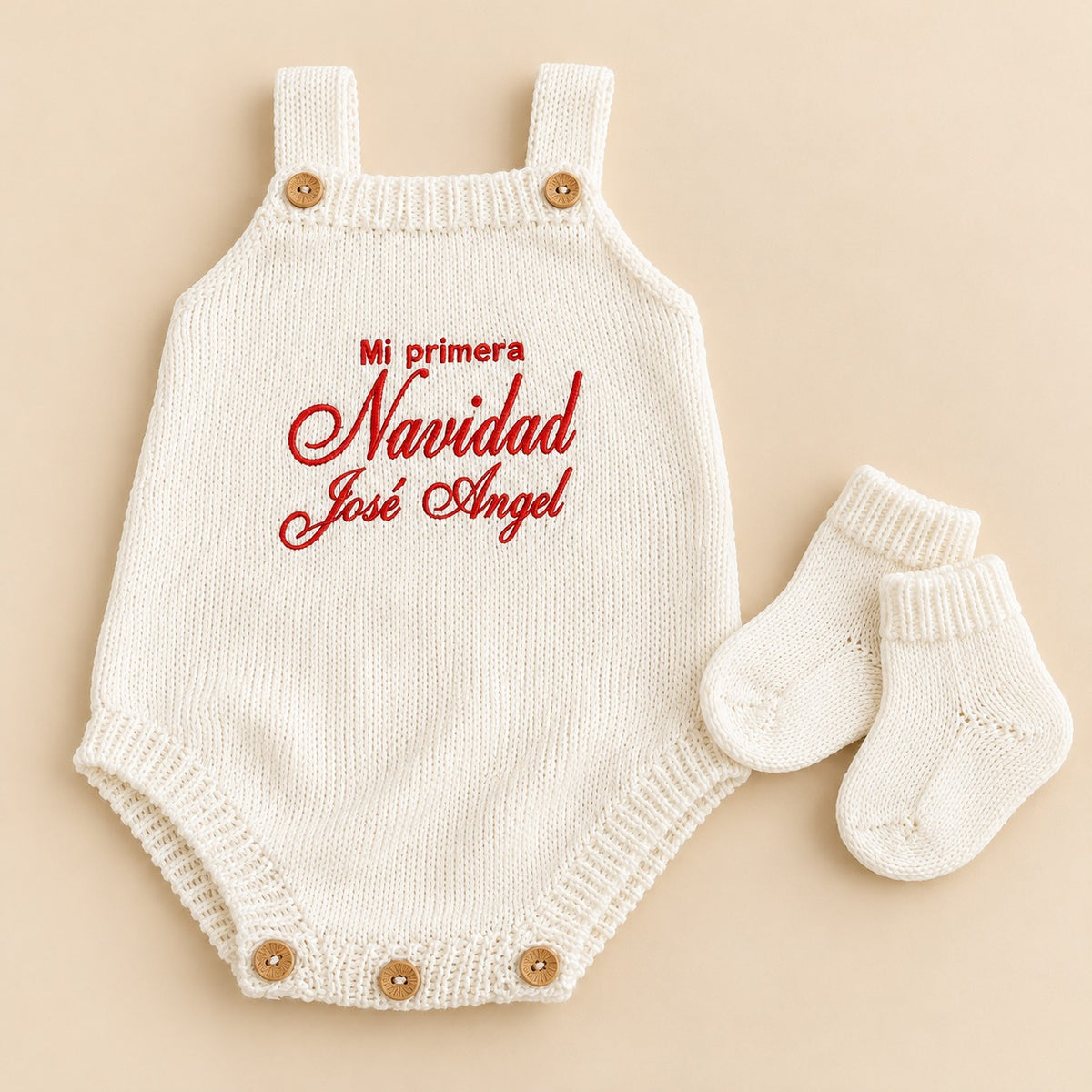 Body blanco Mi Primera Navidad con medias blancas y nombre José Ángel como ejemplo de personalización