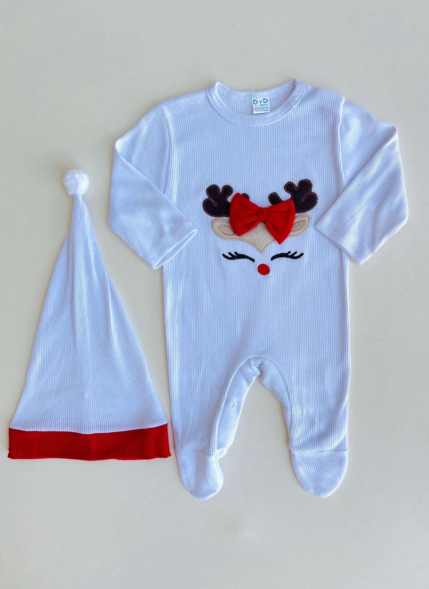 ENTERIZO NAVIDEÑO DE RENITO NIÑA CON GORRO