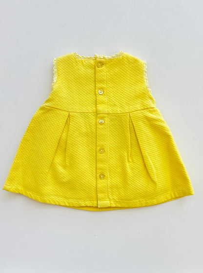 VESTIDO TEXTURIZADO CON LAZOS