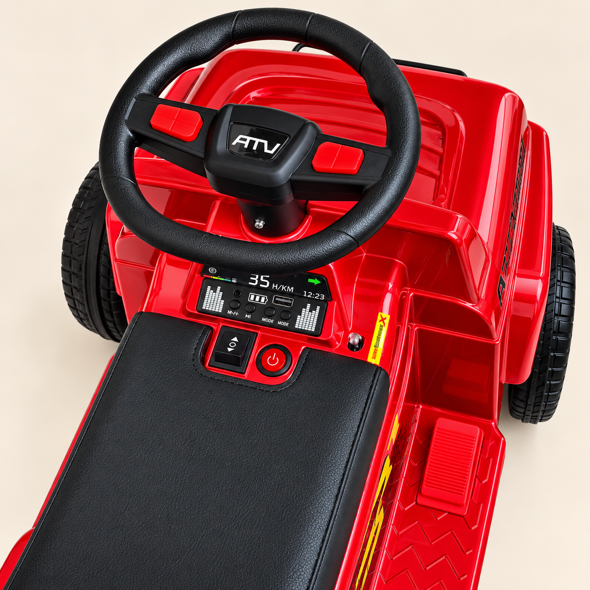 Detalle del volante ATV, botones y panel de controles de la cuatrimoto Monastery roja