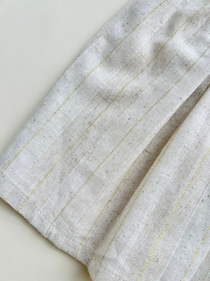 VESTIDO EN LINO CON LAZOS DE PUNTOS