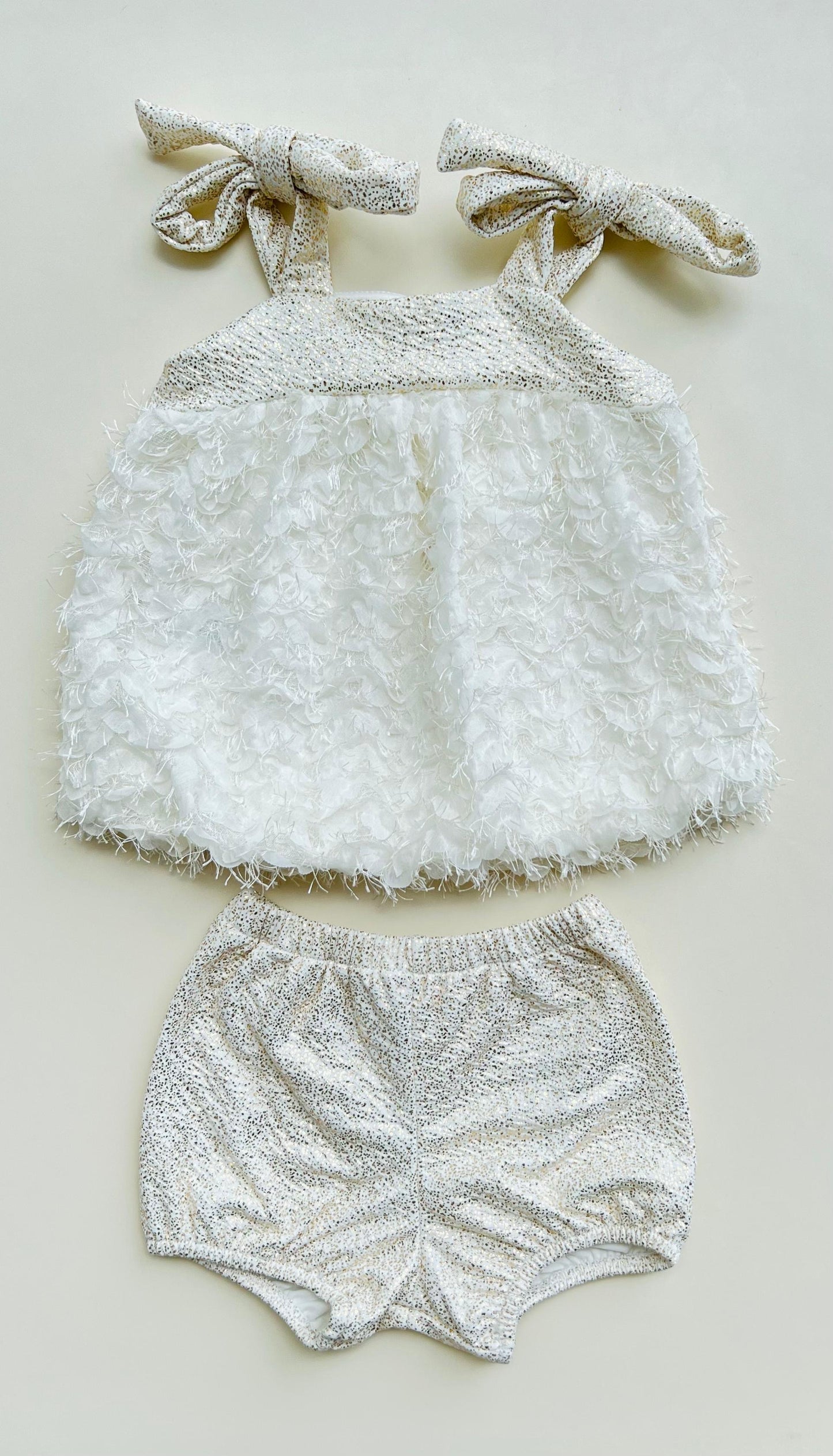 CONJUNTO PÉTALOS SUAVE